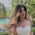 ميرنا جميل تتألق بفستان أبيض على إنستجرام