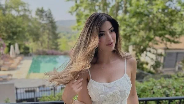 ميرنا جميل تتألق بفستان أبيض على إنستجرام