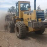 رفع 1200 طن مخلفات من طريق بني زيد- فزارة بالقوصية