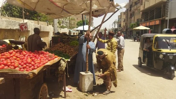 حملة لإزالة إشغالات شارع 23 يوليو في أسيوط