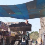 حملات لرفع الإشغالات في الصف تمهيداً لنقل الباعة