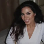 نسرين أمين تتألق بالفستان الأبيض