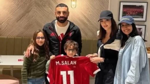 أبناء تامر حسني وطليقته في صور مع محمد صلاح