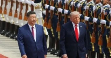 كود سري في مصافحة ترامب وشي جين بينج