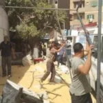 حملات مكثفة في حي البساتين لضبط الشوارع وإزالة المخالفات