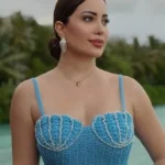 نسرين طافش تبرز أنوثتها بفستان أحمر أنيق