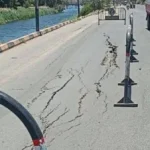 هبوط جزئي بطريق ترعة أصفون في إسنا