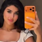 كارولين عزمي تتألق بفستان أبيض رائع