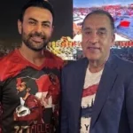 محمد كريم يشيد بالعاصمة الجديدة خلال مباراة مصر وبلجيكا